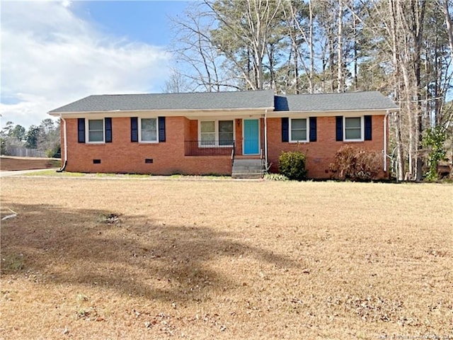 single story home featuring a front yard