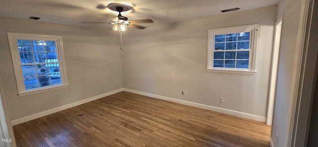 unfurnished bedroom featuring wood-type flooring and ceiling fan