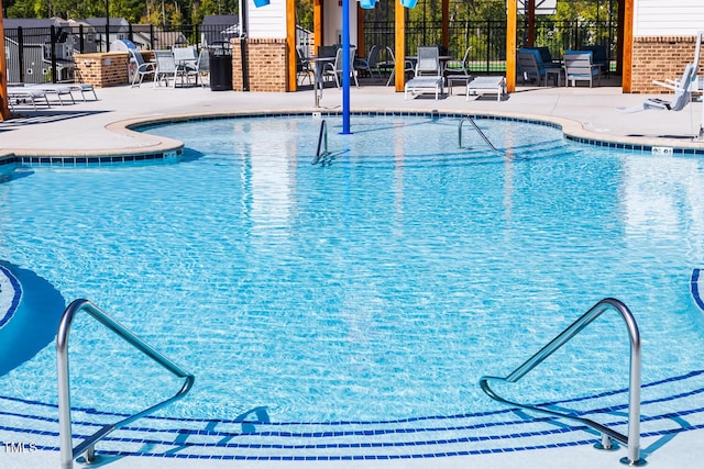 view of pool with a patio area