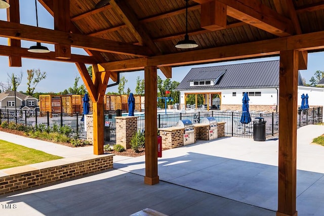 view of patio / terrace featuring a gazebo and area for grilling