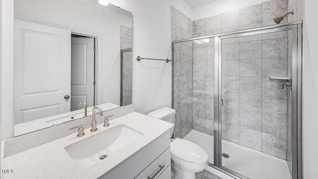 1705 Clydner Dr, Cary, NC 27523 - bathroom featuring a shower stall, toilet, and vanity