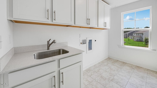 1705 Clydner Dr, Cary, NC 27523 - laundry area featuring cabinet space, washer hookup, hookup for an electric dryer, and baseboards