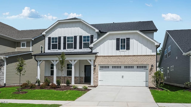 1705 Clydner Dr, Cary, NC 27523 - craftsman-style home with board and batten siding, a porch, driveway, and a garage