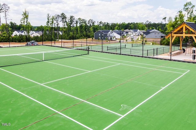 1705 Clydner Dr, Cary, NC 27523 - view of tennis court with fence, community basketball court, and view of wooded area