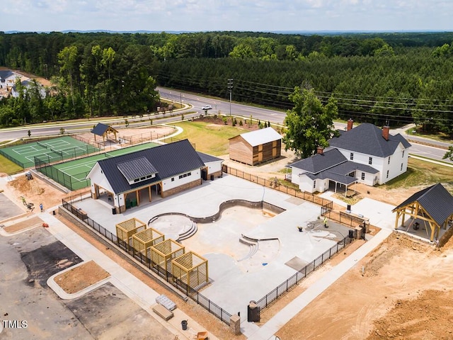 1705 Clydner Dr, Cary, NC 27523 - aerial view of property and surrounding area featuring a heavily wooded area