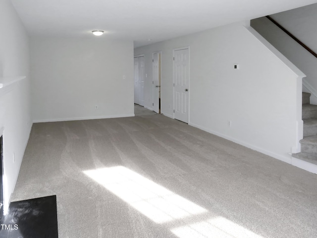 130 Luxon Pl, Cary, NC 27513 - interior space with baseboards, carpet floors, and stairway