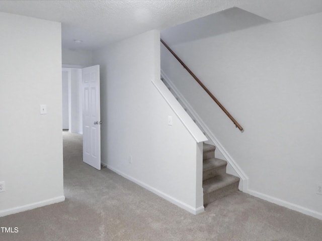 130 Luxon Pl, Cary, NC 27513 - stairs featuring baseboards, carpet floors, and a textured ceiling