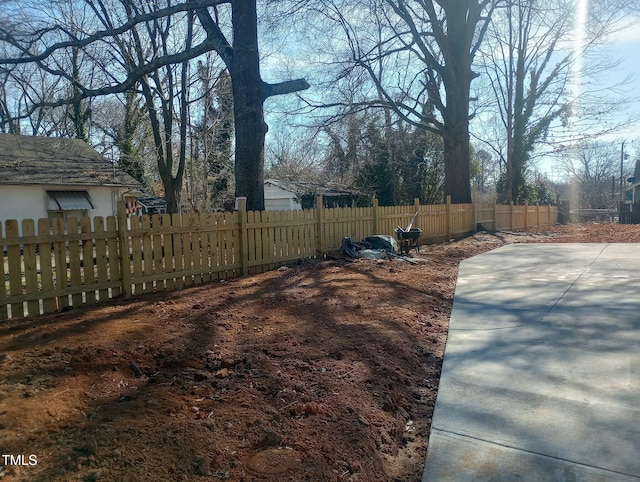 view of yard with fence