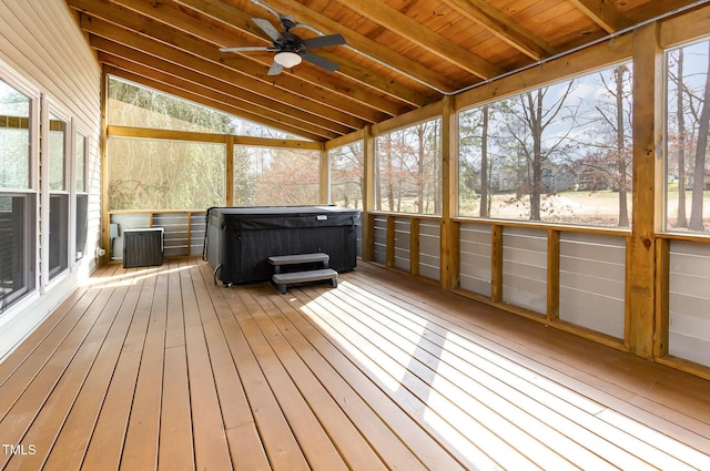 unfurnished sunroom with wooden ceiling, ceiling fan, lofted ceiling with beams, and a sauna