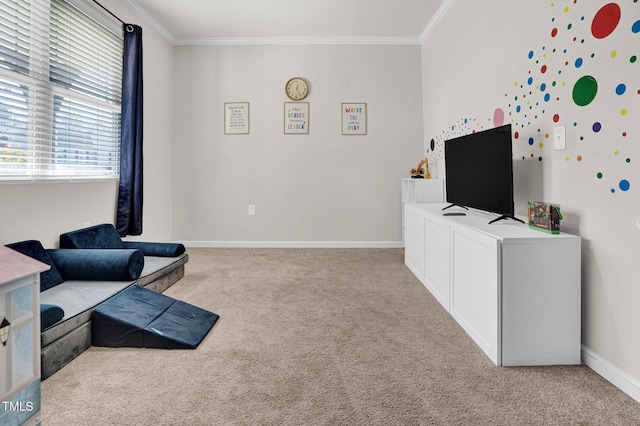 sitting room featuring ornamental molding and light carpet