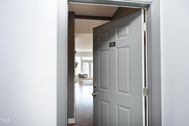 hallway featuring wood finished floors