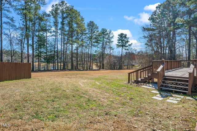 view of yard with a deck