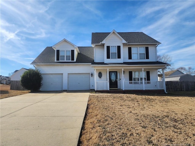 front of property with a porch and a garage