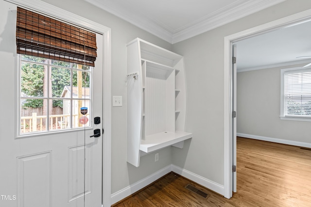 mudroom featuring hardwood / wood-style flooring and crown molding