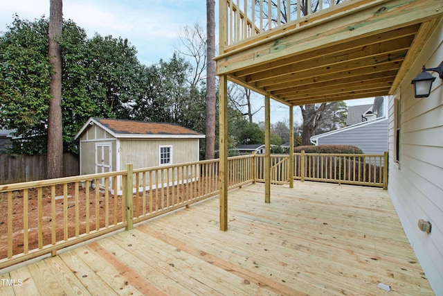 wooden terrace featuring a storage shed