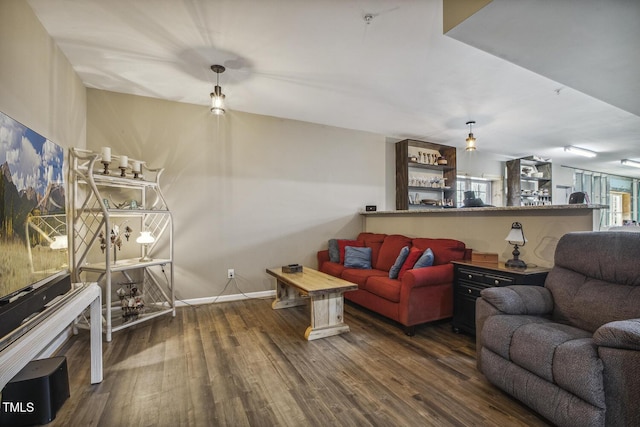 living room with dark wood-type flooring