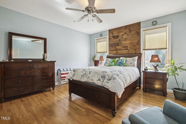 bedroom featuring ceiling fan and light wood-type flooring