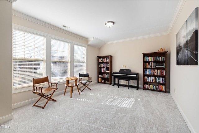 sitting room featuring baseboards, visible vents, crown molding, and carpet flooring