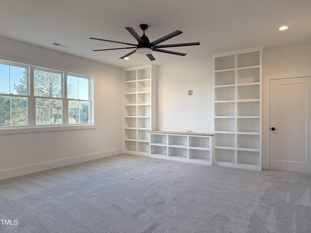 interior space with recessed lighting, a ceiling fan, baseboards, visible vents, and carpet