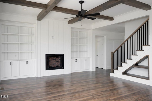 321 Bud Wall Rd, Youngsville, NC 27596 - unfurnished living room with beam ceiling, built in features, wood finished floors, and ceiling fan