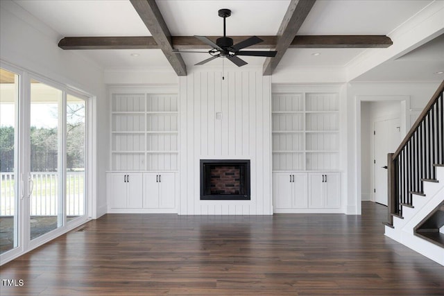 321 Bud Wall Rd, Youngsville, NC 27596 - unfurnished living room featuring a healthy amount of sunlight, stairs, ceiling fan, and wood finished floors