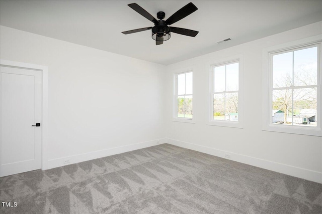321 Bud Wall Rd, Youngsville, NC 27596 - unfurnished room with visible vents, carpet flooring, baseboards, and ceiling fan