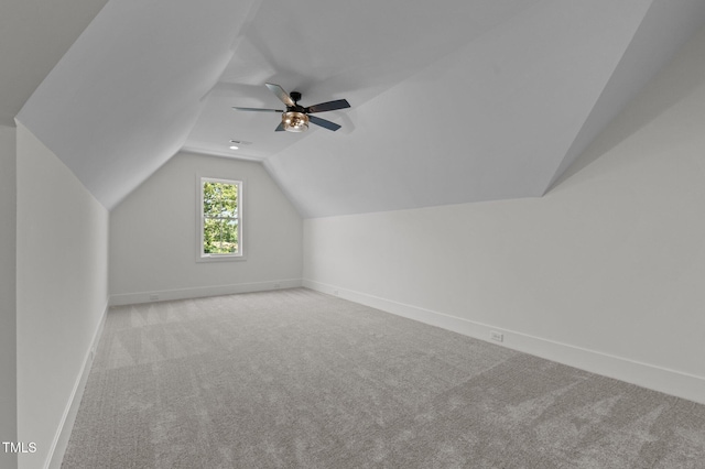 321 Bud Wall Rd, Youngsville, NC 27596 - bonus room featuring carpet flooring, lofted ceiling, baseboards, and ceiling fan
