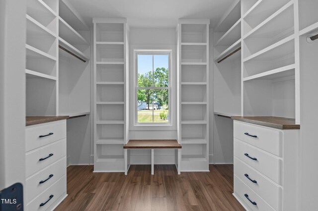 321 Bud Wall Rd, Youngsville, NC 27596 - walk in closet with dark wood-type flooring