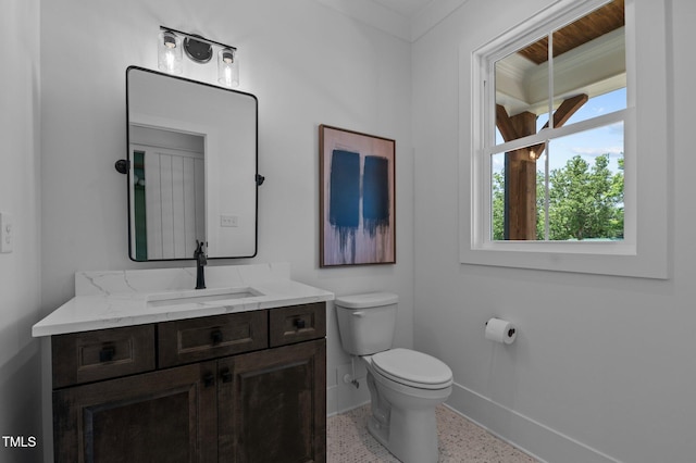 321 Bud Wall Rd, Youngsville, NC 27596 - half bathroom featuring baseboards, speckle patterned floor, vanity, and toilet