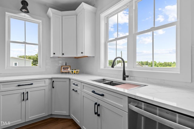 321 Bud Wall Rd, Youngsville, NC 27596 - kitchen featuring dishwasher, a sink, white cabinets, backsplash, and dark wood-style flooring