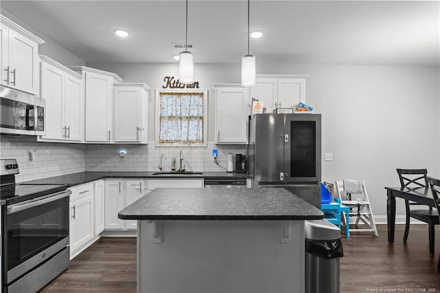 kitchen featuring white cabinetry, sink, and appliances with stainless steel finishes