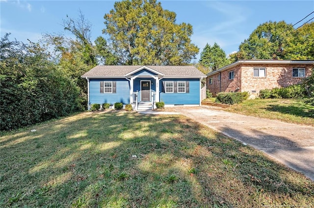 single story home with a front yard