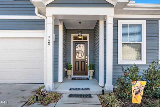 property entrance with a garage