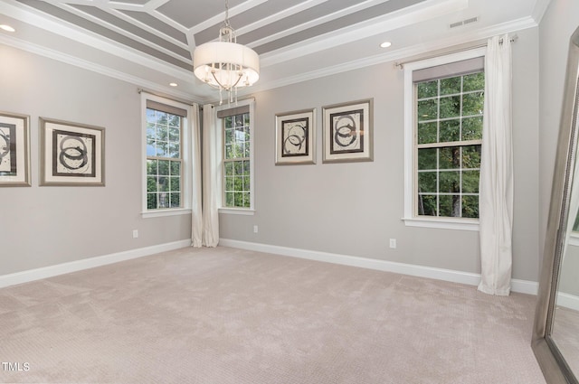 carpeted spare room with crown molding, beam ceiling, and a chandelier