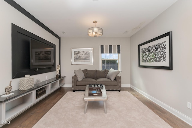 living room featuring dark hardwood / wood-style flooring