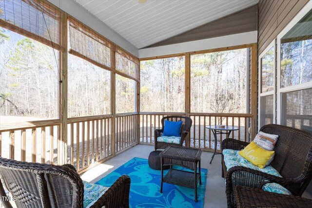 sunroom / solarium with lofted ceiling