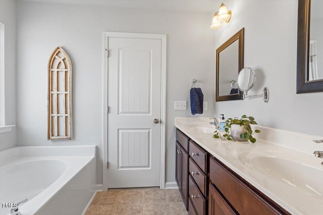 full bathroom featuring double vanity, a garden tub, a sink, and tile patterned floors