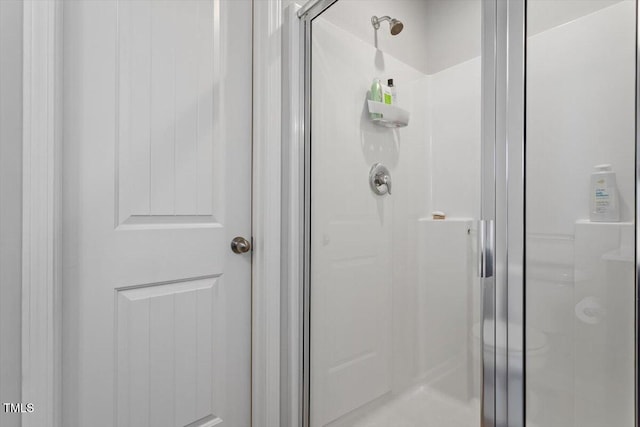 bathroom featuring a stall shower