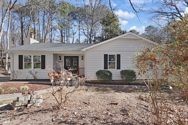 single story home featuring french doors