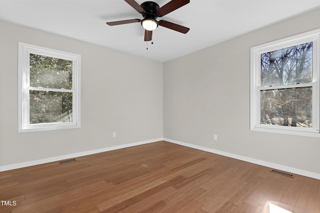 unfurnished room featuring wood-type flooring and ceiling fan