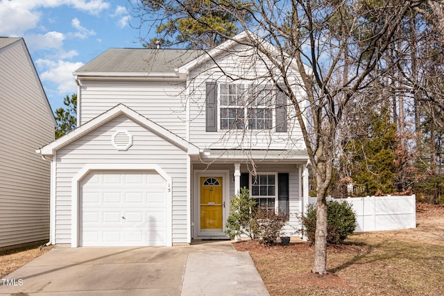 front of property with a garage