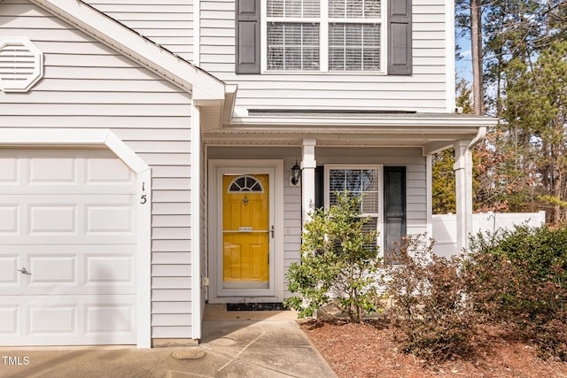 property entrance with a garage