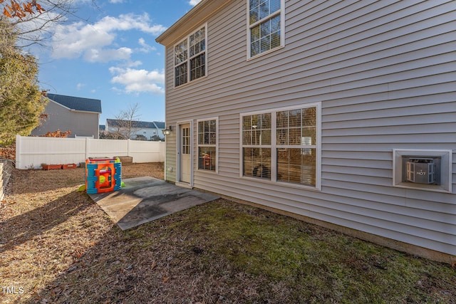 back of property featuring a patio