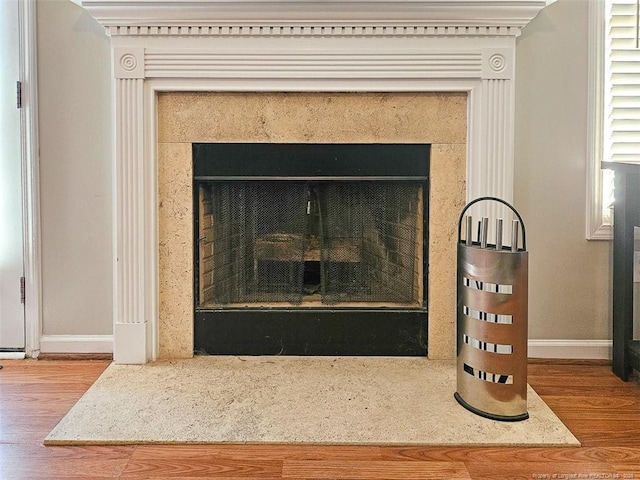 interior details featuring wood-type flooring