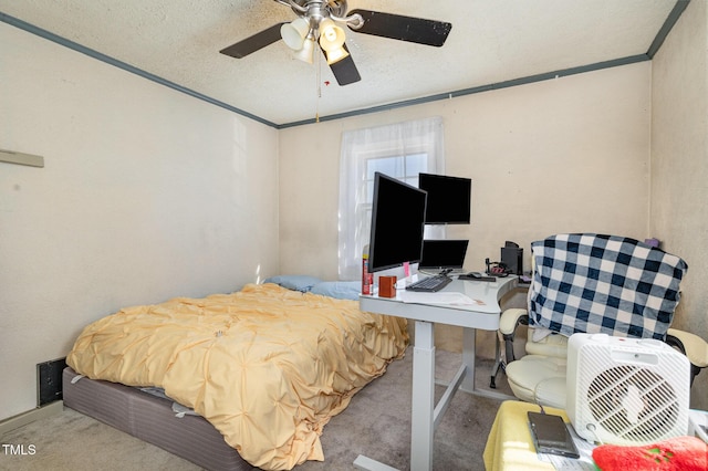 bedroom featuring crown molding, carpet flooring, ceiling fan, and a textured ceiling