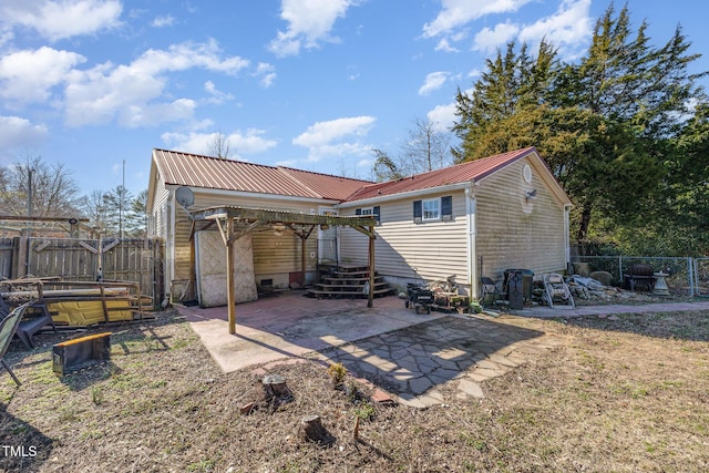 rear view of house featuring a patio area