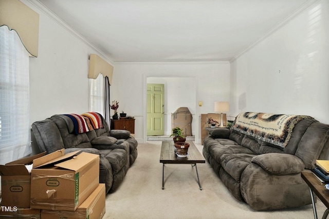 carpeted living room featuring ornamental molding