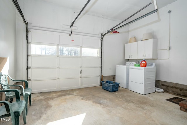 garage featuring washer and clothes dryer