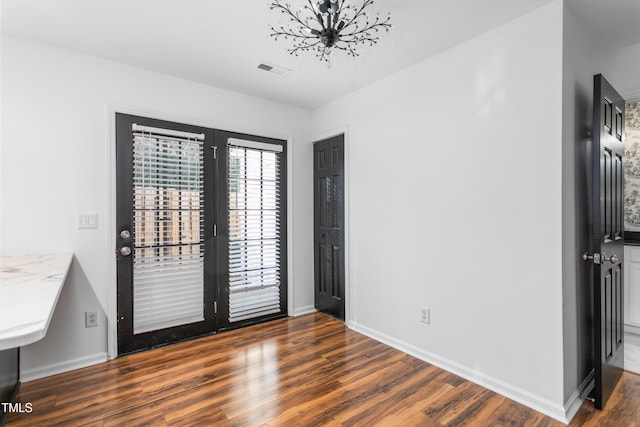 empty room featuring dark hardwood / wood-style floors