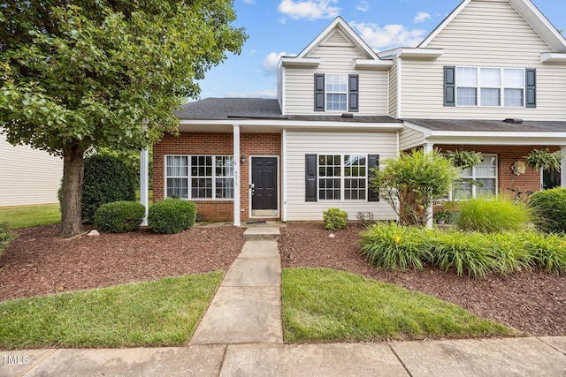 4619 Cross Ridge Ln, Greensboro, NC 27410 - view of front facade featuring brick siding and roof with shingles